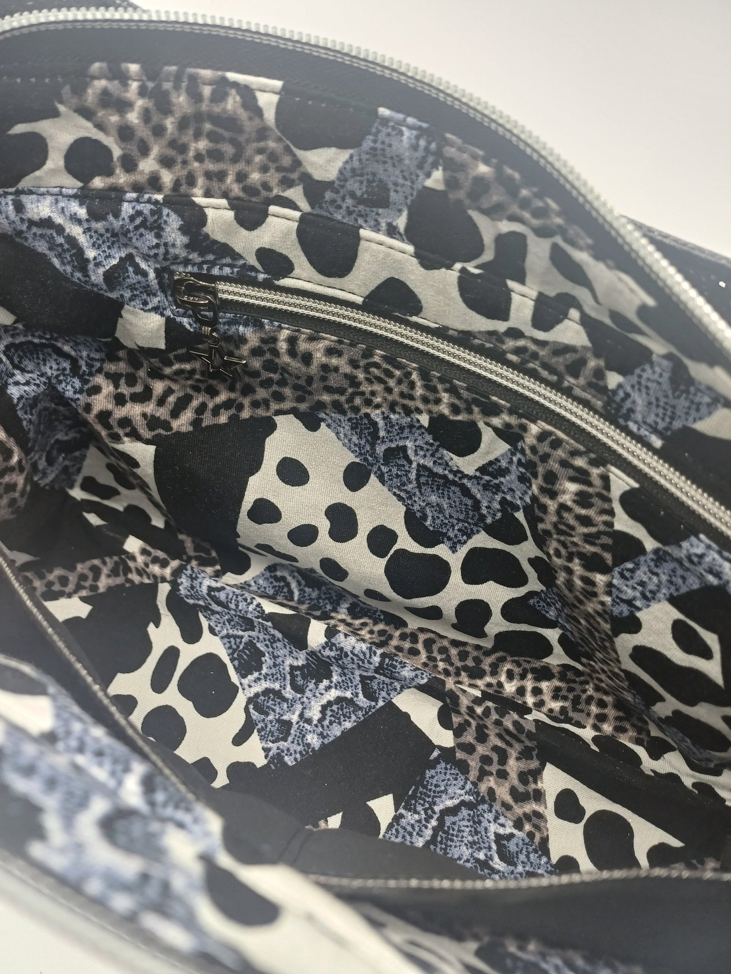 Handtasche Kiana Leoprint